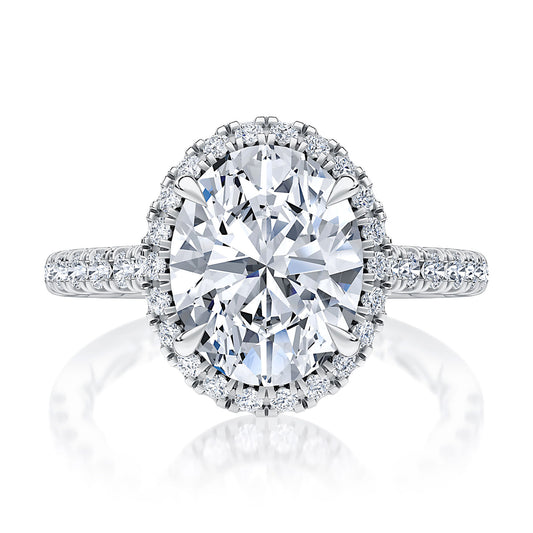 Delicate Oval Cut Diamond Halo Engagement Ring